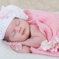 Які умови виплати допомоги при народженні дитини?