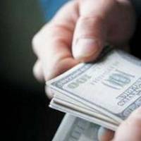 Сільський голова вимагав хабаря в розмірі 1000 доларів