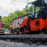На обході Тернополя вже розпочали укладати верхній шар покриття