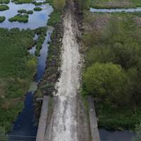 На Зборівщині відновлюють дорогу, яку затопила річка (відео)