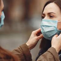 Маски на вулиці носити не треба: постанова уряду про послаблення карантину