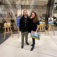 У Варшаві на виставці «Воїни світла» показали картини ветерана з Борщівщини, який малює без рук (фото)